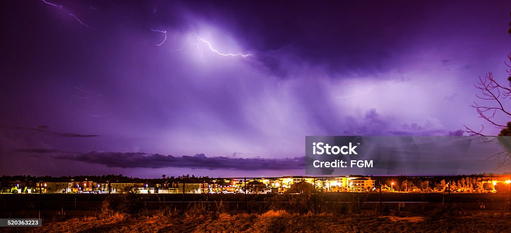 Lightning A lightning storm hangs above a residential neighbourhood. Florida - US State Stock Photo