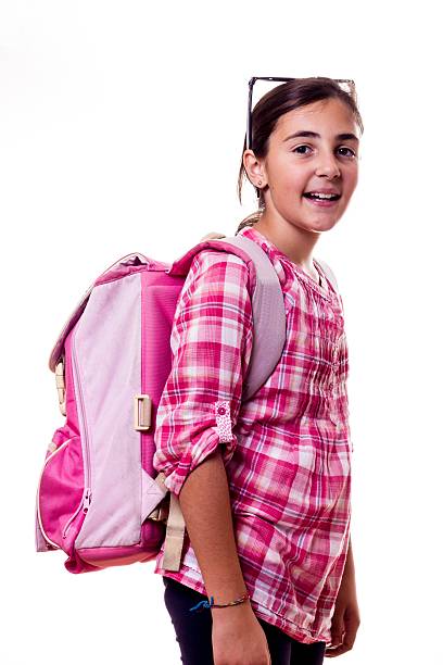 istock smiling little girl with backpack 520363899
