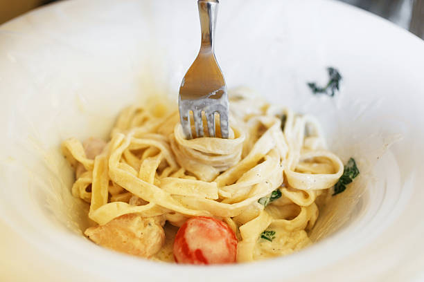 tagliatelle with chicken in a creamy sauce
