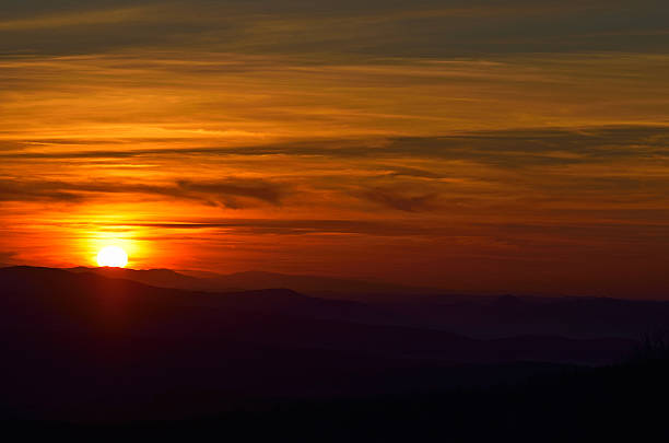 Beautiful summer sunrise in mountains stock photo