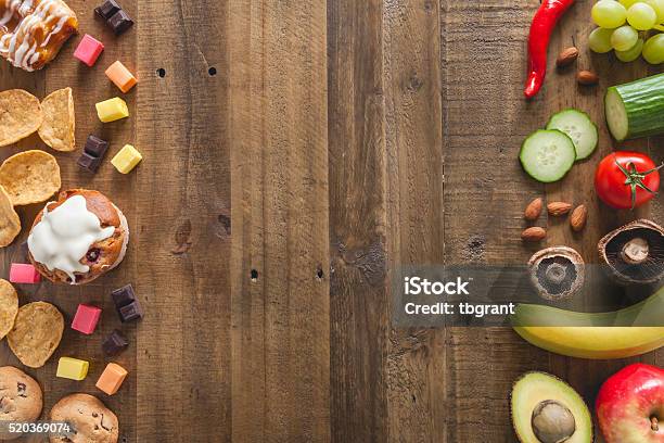 Unhealthy Food And Healthy Food Stock Photo - Download Image Now - Healthy Lifestyle, Snack, Unhealthy Eating