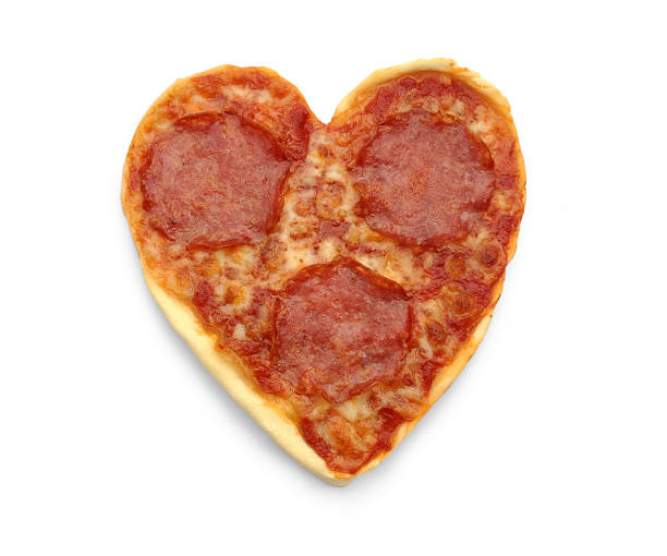 istock Salami Pizza in heart shape, isolated 520388463