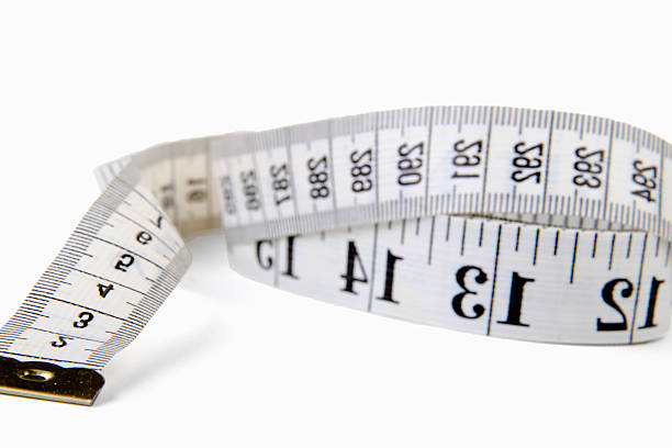 istock Measuring Tape, isolated on white background. 520389067
