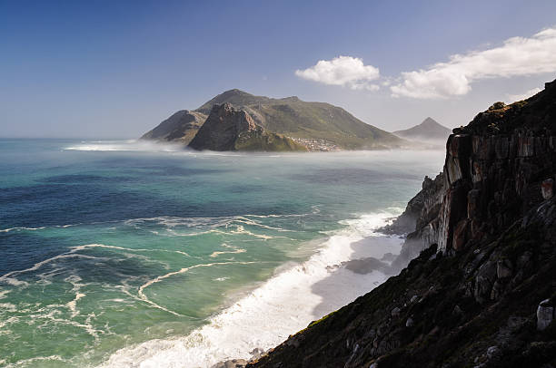 Hout Bay - Western Cape, South Africa Hout Bay seen from Chapman's Peak Drive. chapmans peak drive stock pictures, royalty-free photos & images