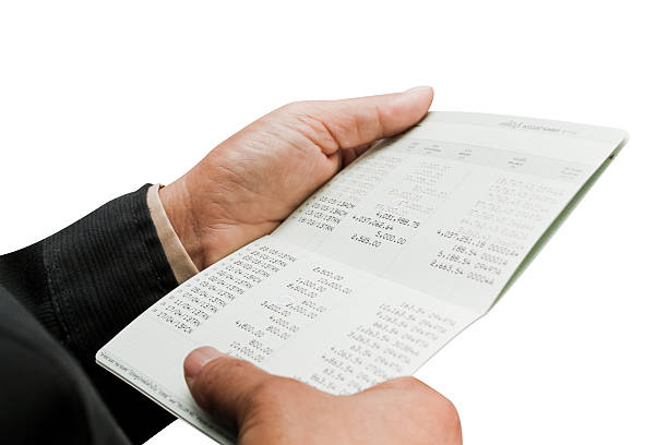 istock Hand holding bank account. 520389601