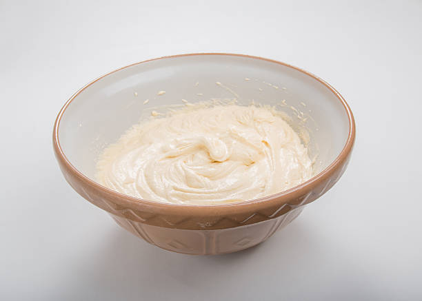 istock Making sponge cake, Mixing bowl with sponge cake batter 520391021
