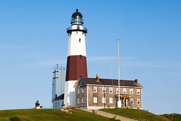 Montauk Point Lighthouse Montauk Point Lighthouse, the oldest lighthouse in New York State. The Lighthouse was authorized by the Second Congress, under President George Washington, in 1792,  and was completed on November 5, 1796. The Montauk Point Lighthouse became a National Historic Landmark in 2012. montauk point stock pictures, royalty-free photos & images