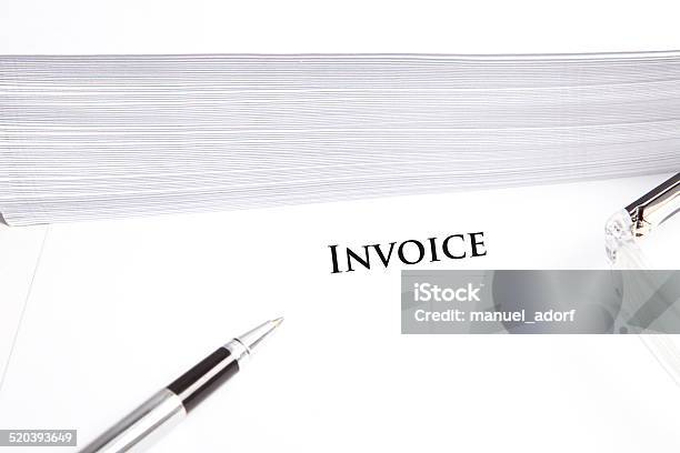 Invoice Headline On Blank White Document With Glasses Pen Evelopes Stock Photo - Download Image Now