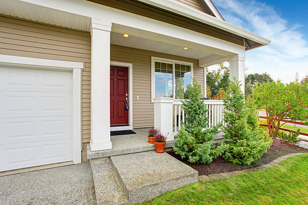 istock Entrance porch with front yard landscape 520394187