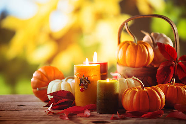 istock Pumkins and candles on an outdoor table 520407829