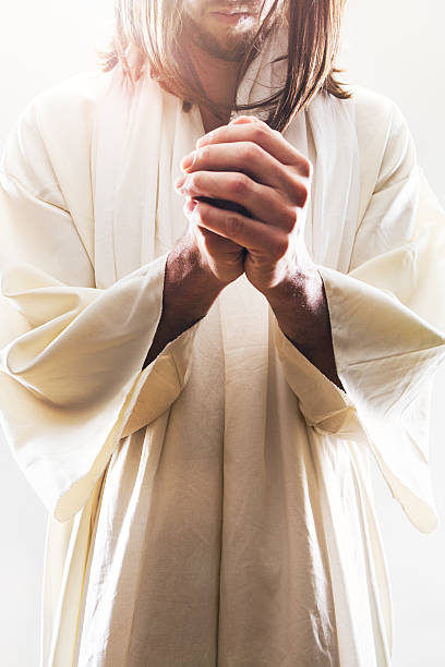istock Jesus Christ Figure Praying 520408011