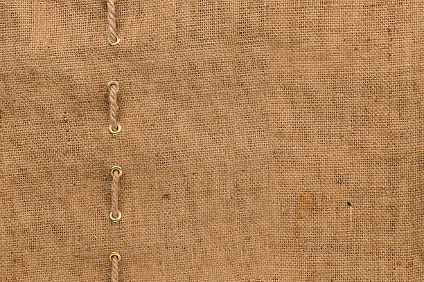 arpillera con una línea de cuerda - textured bagging rope rough fotografías e imágenes de stock
