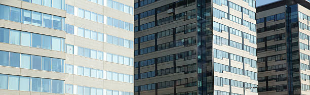 panorama di edifici aziendali - apartment building exterior urban scene window foto e immagini stock