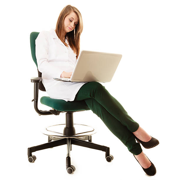 istock Medical. Woman doctor working on computer laptop 520409395