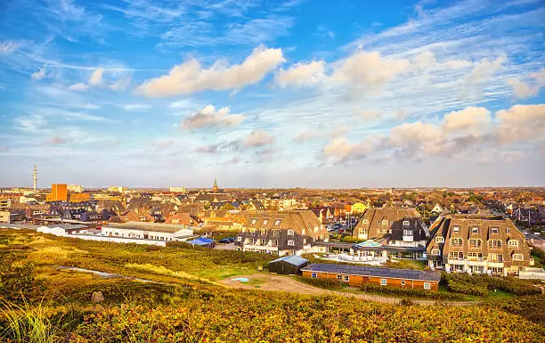 Elevated view over the skyline of Westerland at sunset.