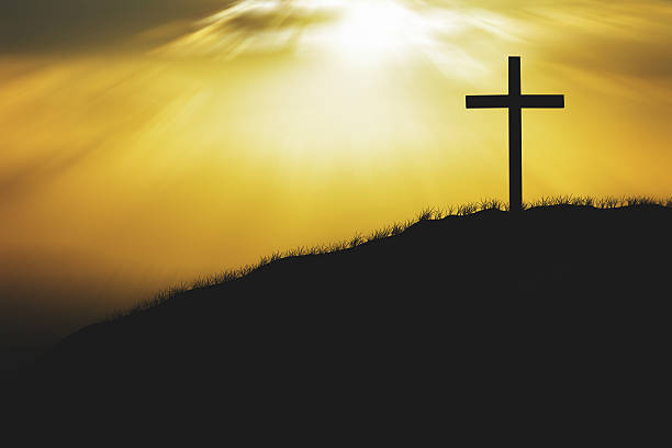 istock silhouette of cross 520409828