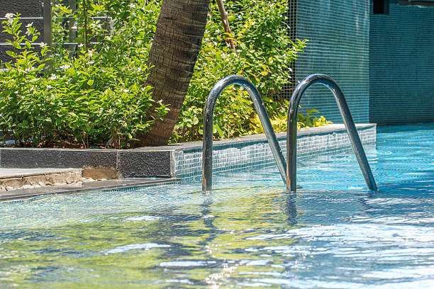 istock Swimming Pool with Stair at Hotel Close Up. 520410009