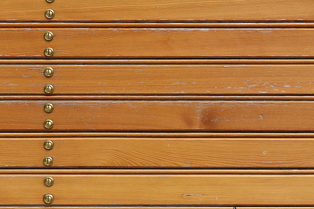 Wooden varnished planks with screws - background #2 stock photo