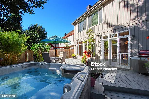 Backyard With Hot Tub And Patio Area Stock Photo - Download Image Now - Hot Tub, Outdoors, Patio