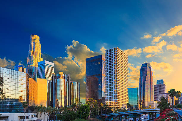 istock Skyscrapers of Los Angeles skyline with freeway, CA 520410517