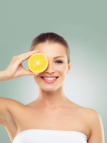 istock Revitalising her skin with some citrus 520410557