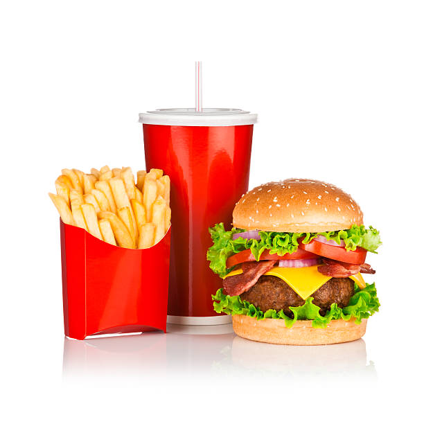 istock Take out food, classic cheeseburger meal on reflective white backdrop 520410691