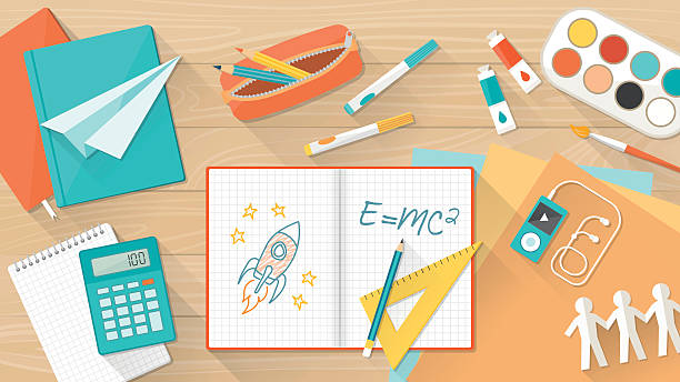 Creative kid desktop Creative young student desktop with notebook, books and colors, education, learning and childhood concept school desk above stock illustrations