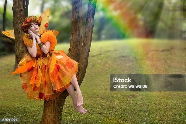 Sleeping Fairy In Forest Under Colourful Rainbow Stock Photo - Download Image Now - 20-29 Years, Adult, Adults Only