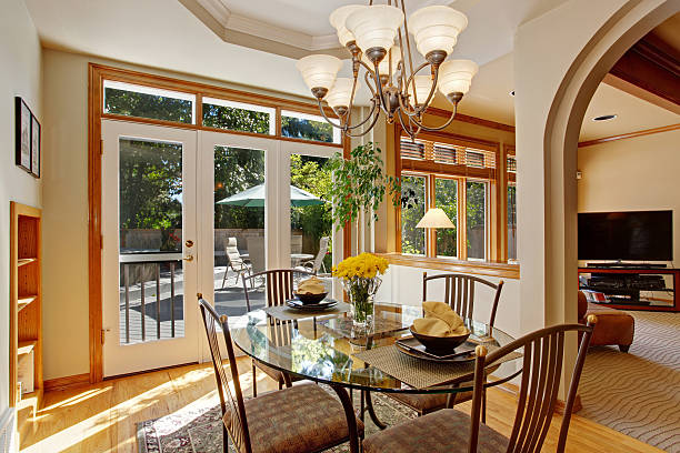 istock Dining table with fresh flowers in luxury american house 520411827