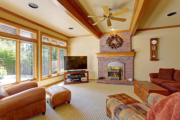 istock Living room with brick fireplace and ceiling beams 520411839