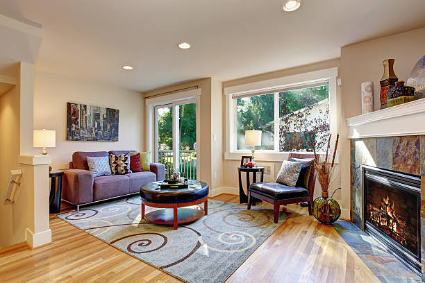 istock Cozy room with fireplace and walkout deck 520413221