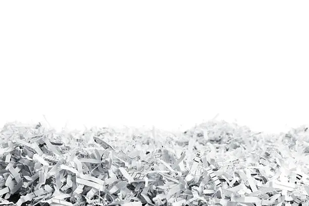 Big heap of white shredded papers isolated on white