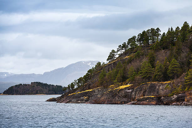 istock Landscape, sea and dark mountains, Norway 520414636