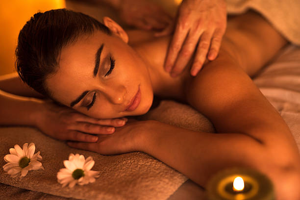 istock Beautiful woman enjoying during massage at the spa. 520414754