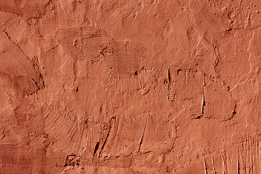 Abstract red cement wall texture. Architectural background and texture for design.