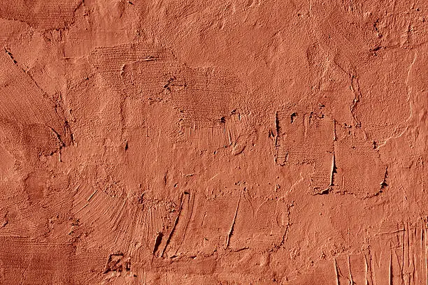 Photo of Abstract red cement wall texture.