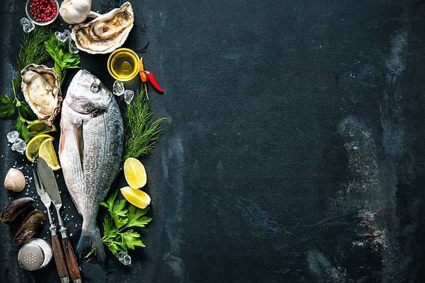 istock Delicious fresh fish and oysters 520422772