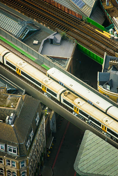 istock Trains crossing the city 520424724