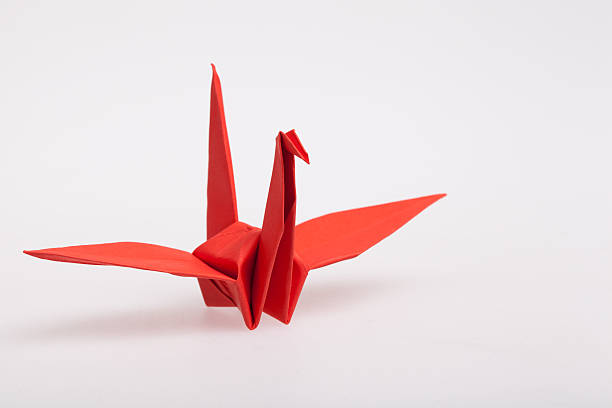 istock Red paper bird, origami. 520437239