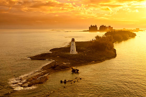 lighthouse and resort on nassau, bahamas at dawn