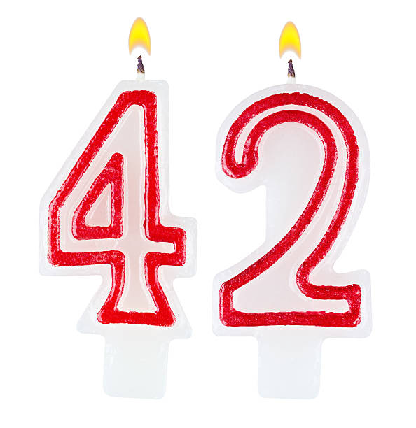 istock Birthday candles number forty two isolated on white background 520442617