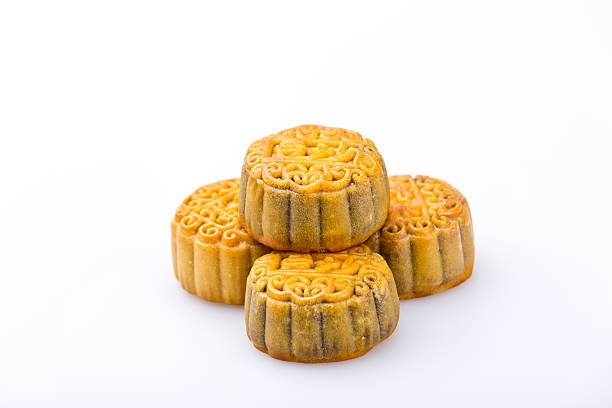 中国の伝統的な food--moon ケーキ - cake yellow sweet food banquet ストックフォトと画像
