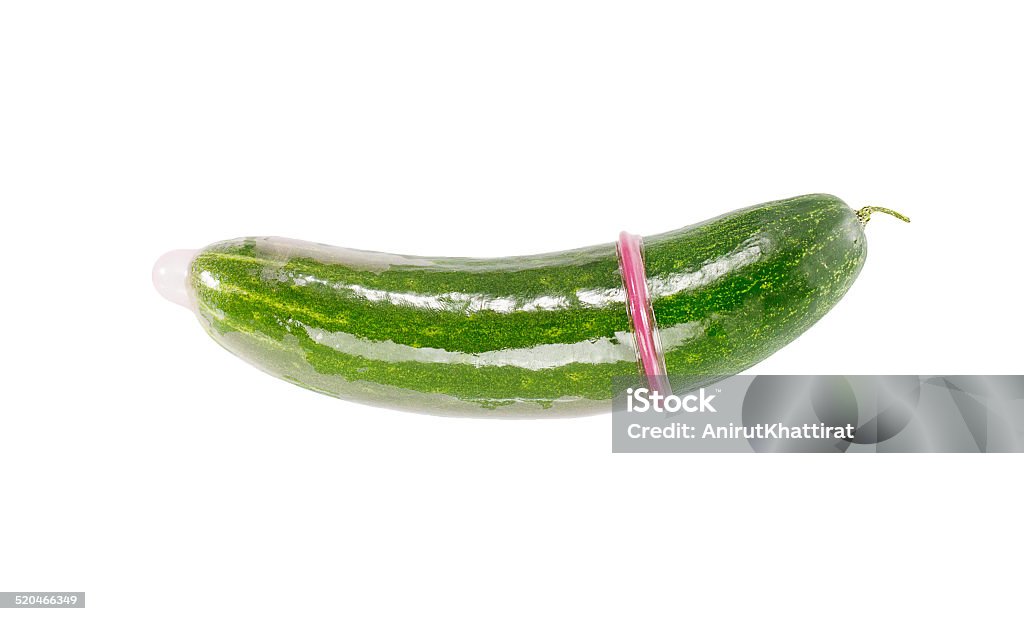 cucumber cucumber with condom on a white background Condom Stock Photo