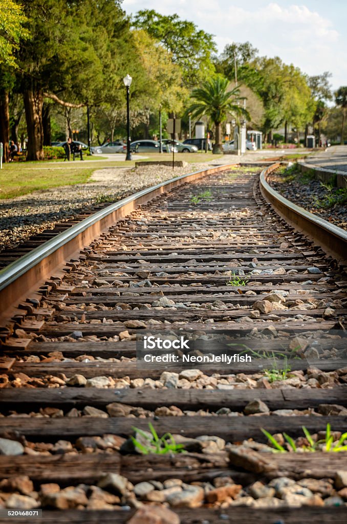 Railway A railway track bends away and and off into the distance Florida - US State Stock Photo