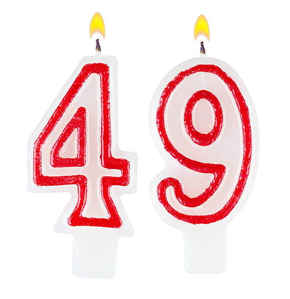 istock Birthday candles number forty nine isolated on white background 520468301