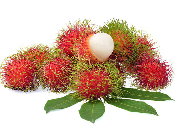 istock Rambutan with leaves isolated on white background 520468907