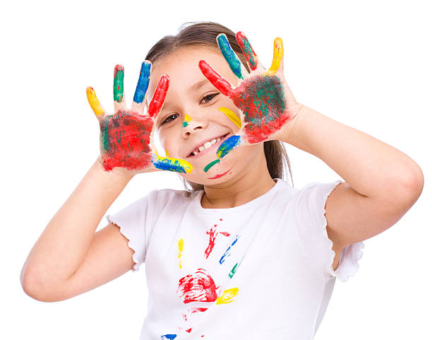 istock Cute girl playing with paints 520473155