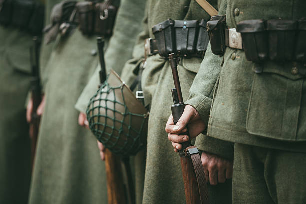 Close up of german military ammunition of a German soldier Close up of german military ammunition of a German soldier. Unidentified re-enactors dressed as World War II German soldiers standing order. german armed forces stock pictures, royalty-free photos & images