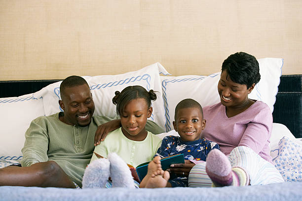 istock Family reading stories together 520489844