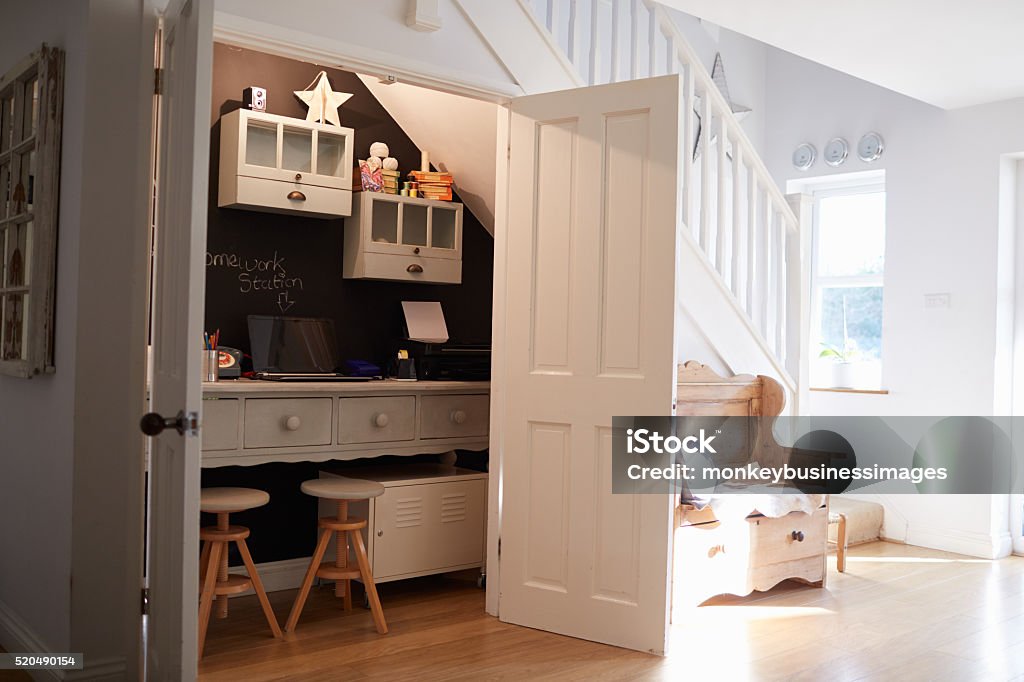 Under Stairs Home Office In Contemporary Family Home Staircase Stock Photo